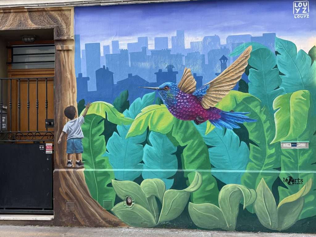 Boy and A Hummingbird Street Art Paris