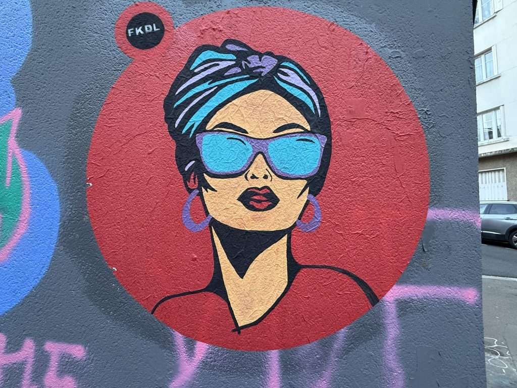 Woman in Sunglasses and a Turban Paris Street Art